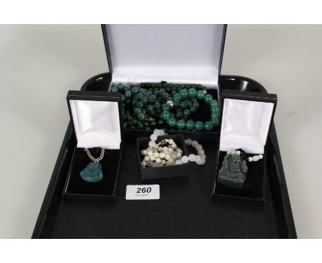 A collection of jade and other bead necklaces, two jade type pendants etc
