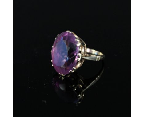 A 9ct gold ring set with large amethyst, size M 1/2