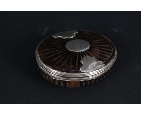 A fine early 18th Century oval tortoiseshell snuff box with white metal cartouche, inscribed EB with standout hinge, circa 17