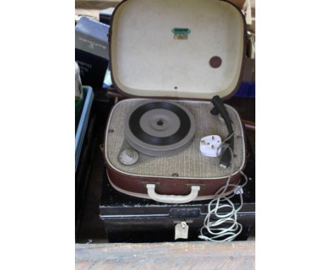 A black japanned deed box containing cameras, cash tin, gas mask plus a Fidelity record player (this item is sold as a collec