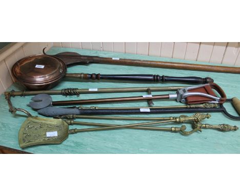 A set of three brass fire irons, curtain pole, Victorian copper warming pan, shooting stick, boat gaff etc