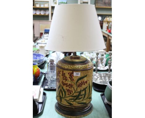 A floral painted table lamp
