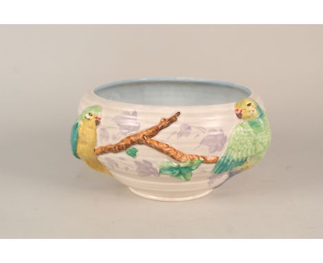 A Clarice Cliff parrot decorated bowl