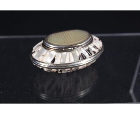 A fine 18th Century mother of pearl and cowrie shell white metal mounted snuff box