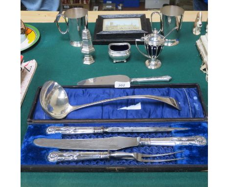 SUNDRY LOT INCLUDING SILVER HANDLED CARVING SET, TANKARDS, LADLE AND TWO PRINTS, ETC. 