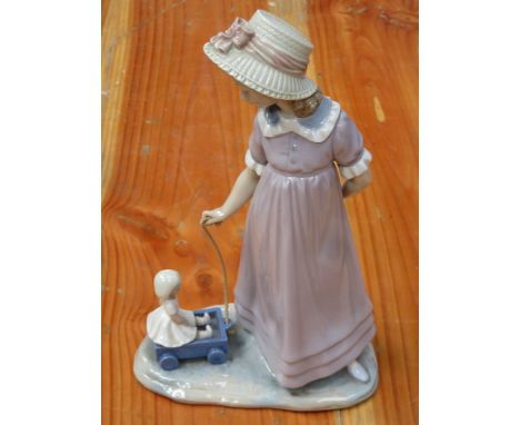 LLADRO GLAZED CERAMIC FIGURE OF A LADY WITH DOLL, APPROXIMATELY 28cm HIGH 