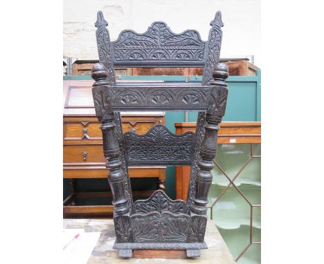 EBONISED CARVED OAK STICK STAND 