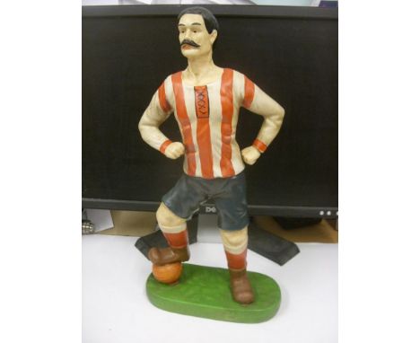 MEMORABILIA, Circa 1970's, Brentford Football Club, early 1900's style footballer, red &amp; white shirt, ceramic figure, sta