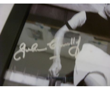 BURNLEY, 1962, a framed &amp; glazed (Perspex) autographed football photograph, John Connelly (Hand Signed) in an action pose