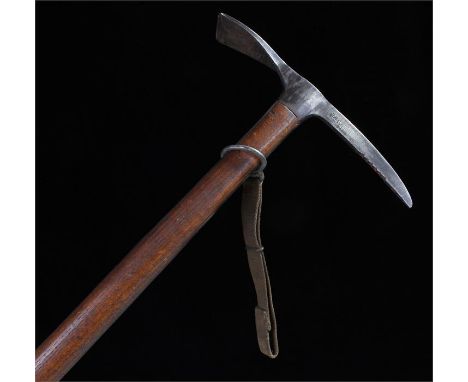 World War II Brades ice axe, the head stamped BRADES ^ 1943 above the oak shaft and loop, spike to the end, total length 84cm