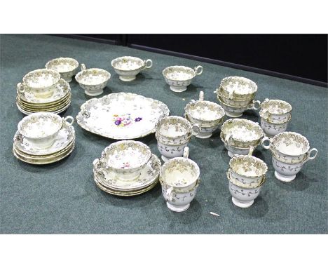 Victorian gilt-edged floral-patterned porcelain service, consisting of 10 coffee cups, 14 tea cups, 15 saucers, and a plate (