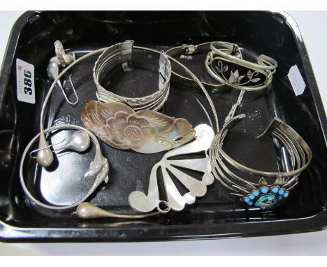 Two Egyptian Style Wide Cuff Bangles, one with imitation scarab beetle detail, shell inset bangle, dolphin bangle, teardrop s