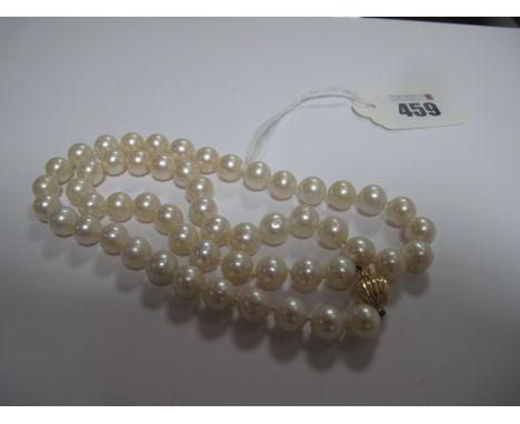 A Single Strand Uniform Pearl Bead Necklace, to "585" textured clasp.