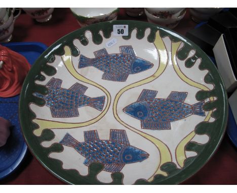 Studio Pottery Red Earthenware Plate, 33cm, incised decoration of four fish in blue slip with dark green slip to edge, base i