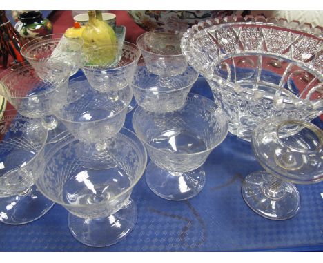 Georgian Oil/Lacemakers Lamp, with incised twist stem, a cut glass fruit bowl, nine early XX Century sundae glasses:- One Tra