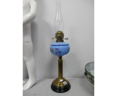 Oil Lamp Circa 1900, with black terracota base, brass reeded support to painted light blue glass well.