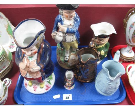 A XIX Century Staffordshire Toby Jug 'Hearty Good Fellow' with tricorn hat, pipe and jug of ale, a lustre toby jug, snuff tak