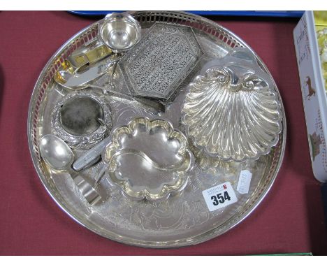 A Hallmarked Silver Shell Butter Dish, a hallmarked silver baby's spoon, a hallmarked silver spoon, a decorative pierced dish