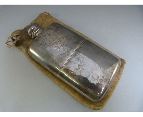A silver hallmarked hip flask Birmingham 1893 weight 289g and engraved with initials in original case. Attributed to Artist C