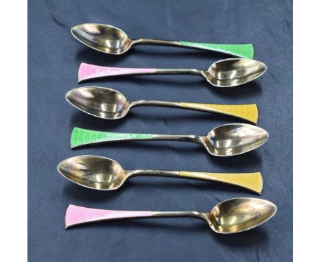 A group of six 1930's silver gilt and enamel coffee spoons, the splayed terminals engine-turned and guilloche enamelled in gr