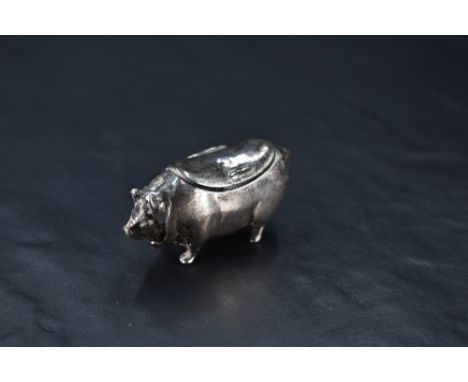 A late Victorian silver pig-form snuff box, having rounded oblong hinged cover, marks for London 1895, maker David Bridge, al