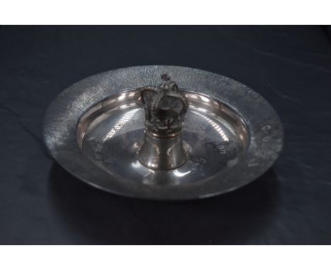 A Queen Elizabeth II limited edition commemorative silver dish, of dished circular form with textured rim enclosing the dishe