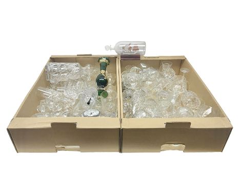 Quantity of crystal and glass ware, to include drinking glasses, Waterford crystal mantel clock, decanter, etc, in two boxes 