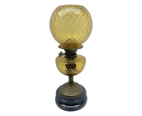 Victorian oil lamp, the glass reservoir upon brass stem and stepped circular base, with glass shade