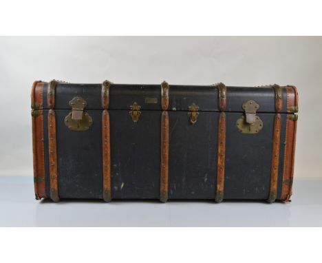 A Raphael Sorrosal of Barcelona beech, leather and copper bound travel trunk, with brass fittings, lacking inner tray and com