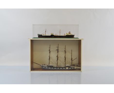 A hand painted scratch built ship model set in glass and wooden display case, together with another example in perspex case (