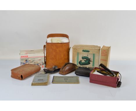 A Palitoy safety sewing machine, a Singer Mini Mender, a folding travel iron, the Art of Needlecraft by R K Polkinghorne, a S