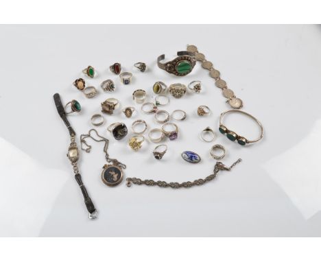 A collection of silver jewellery, including paste set rings, with tiger's eye, smoky quartz, cameos etc together with a coin 