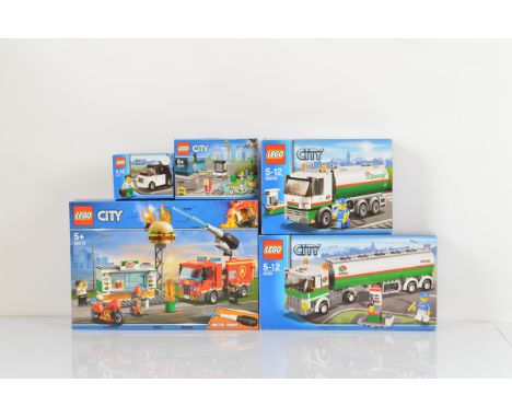 Five boxed Lego City models, including Burger Bar Fire Rescue 60214 unopened, Tank Truck 3180 opened with manual and unchecke