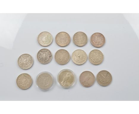 A collection of fourteen Morgan head and Liberty United States of America dollars, earliest 1890, New Orleans and Philadelphi
