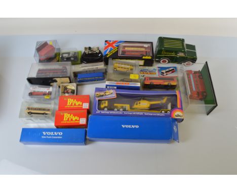 A good quantity of assorted diecast models, including Volvo, Solido, Corgi, EFE Britbus, etc, mostly boxed/cased. Together wi