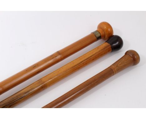 Late 19th/early 20th century stepped Malacca walking stick with metal collar and roundel handle another similar without a col