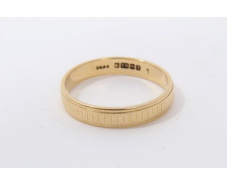 Gold (18ct) wedding ring with line decoration to the band, size PCondition report: Weight 3.3g