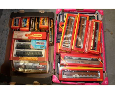 Railway 00 gauge selection of boxed carriages an rolling stock various manufacturers including Hornby, Bachmann, Mainline etc