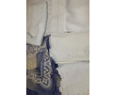 A selection of table linens with lace-work including crochet, bobbin lace and cut-out work. Plus an example of Buckingham bob