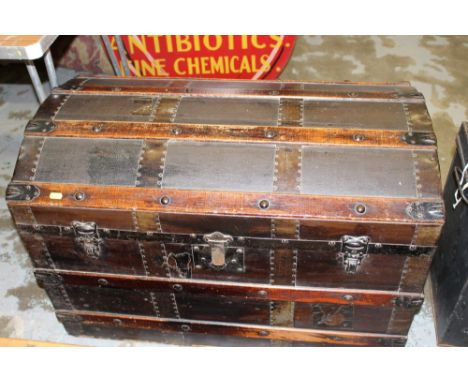 Vintage wooden bound dome top trunk