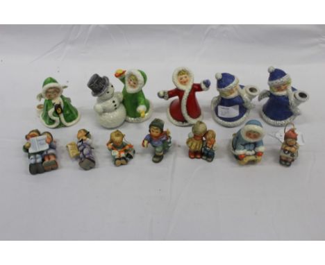 Six Goebel Christmas figures (including 11705, 11708, 42 009-09 x 260, 42412-09) and six Hummel Christmas decorations, includ