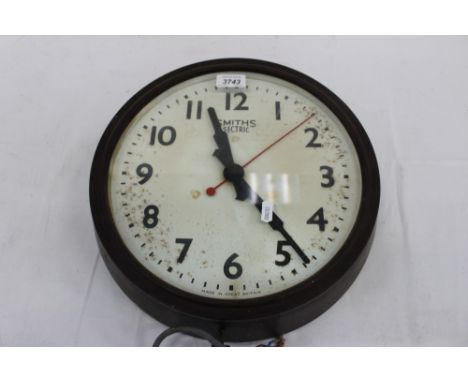 Smiths Electric Bakelite wall clock, and white painted railway lamp