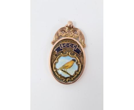 9ct gold and enamel canary fancier’s medal, with enamelled cartouche and banner for S.C.C.C. Chester 1930, approximately 8g