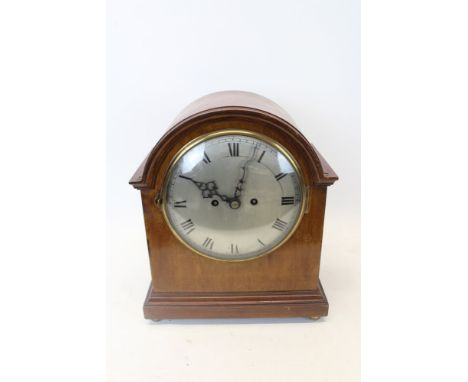 Late Victorian mahogany cased bracket clock with silvered dial, the movement by Goldsmiths Company Ltd.