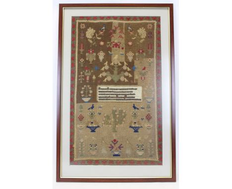 Large 19th century sampler with love heart borders, flowers trees and text. Framed and glazed.