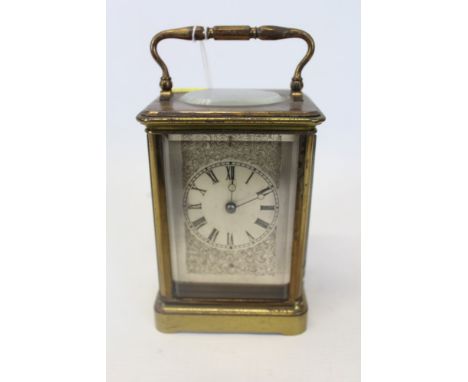 19th century French Aiguilles brass carriage clock with later engraved dial, with engraving on the top dated 1862.