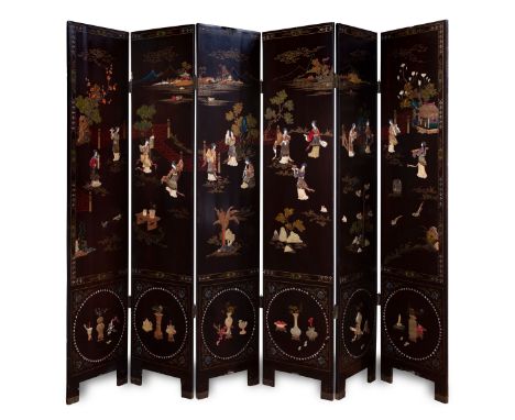 Coromandel folding screen; China, first half of the 20th century.Lacquered wood, hard stones, bone and mother-of-pearl.Measur