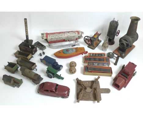 A group of vintage tin plate toys, including a Silver Streak model speed boat, boxed, a Sutcliffe model boat, a Tri-Ang Minc 