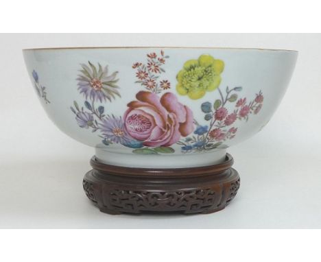 A Chinese Qing Dynasty, 18th century, porcelain bowl, polychrome enamel decorated in the style of James Giles with sprays of 