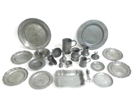 A collection of 17th and 18th century and later pewter items, comprising two wide rimmed plates, 37cm and 35.5cm, seven furth